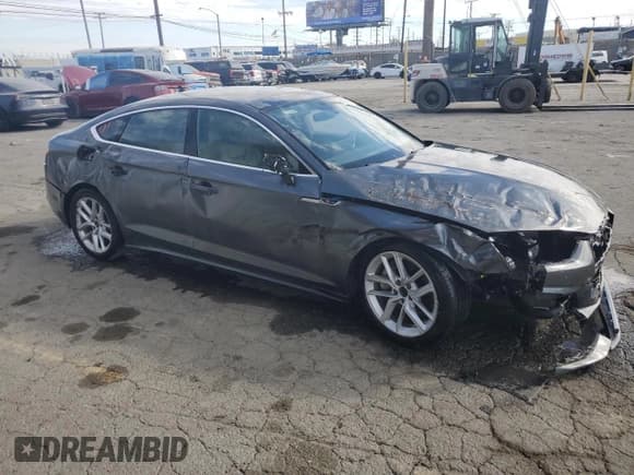 ✅ 2024 Audi A5 Sportback S line Premium Plus • VIN: WAUFACF53RA071001 • Лот: 86098045. Опубликован ранее на Copart с пробегом 22 911 миль. Бесплатный доступ к архиву аукционных продаж из США и подробный отчёт об истории автомобиля на DreamBid. Изображение 4.