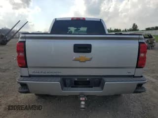 ✅ 2018 Chevrolet Silverado 1500 LT • VIN: 3GCPCREC5JG375778 • Лот: 72532784. Опубликован ранее на Copart с пробегом 97 534 миль. Бесплатный доступ к архиву аукционных продаж из США и подробный отчёт об истории автомобиля на DreamBid. Изображение 6.