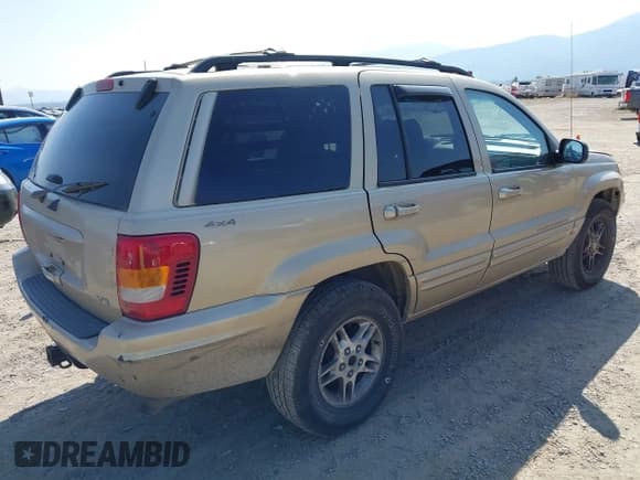 ✅ 2000 Jeep Grand Cherokee Limited • VIN: 1J4GW58N1YC242326 • Лот: 43247505. Опубликован ранее на IAAI с пробегом 261 511 миль. Бесплатный доступ к архиву аукционных продаж из США и подробный отчёт об истории автомобиля на DreamBid. Изображение 4.