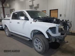 ✅ 2015 Ram 1500 Laramie • VIN: 1C6RR7NM5FS558979 • Lot: 43279953. Listed on IAAI with 149,070 mi. Free auction sales archive from the USA and detailed vehicle history report at DreamBid. Image 1.