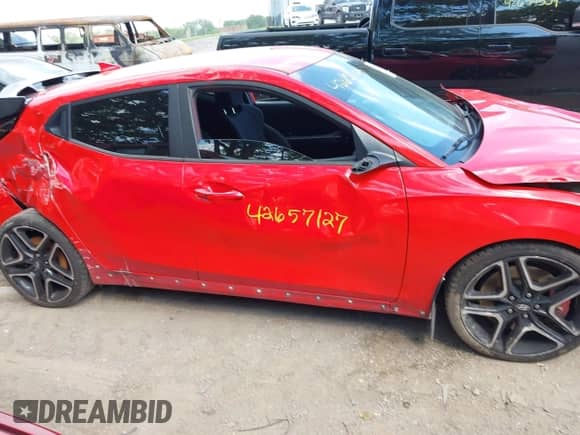 2020 Hyundai Veloster z VIN KMHT36AH0LU004909, wystawiony jako IAAI lot #42657127 z przebiegiem 86 557 mil mil oraz . Historia ofert i sprzedaży dostępna na DreamBid. Obrazek 13.