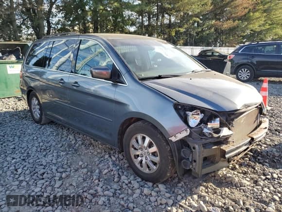 ✅ 2010 Honda Odyssey EX-L • VIN: 5FNRL3H60AB044513 • Lot: 84195805. Listed on Copart with 167,263 mi. Free auction sales archive from the USA and detailed vehicle history report at DreamBid. Image 4.