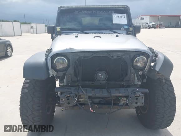 ✅ 2015 Jeep Wrangler Unlimited Rubicon Hard Rock • VIN: 1C4HJWFG1FL718588 • Lot: 42662414. Listed on IAAI with 84,087 mi. Free auction sales archive from the USA and detailed vehicle history report at DreamBid. Image 12.