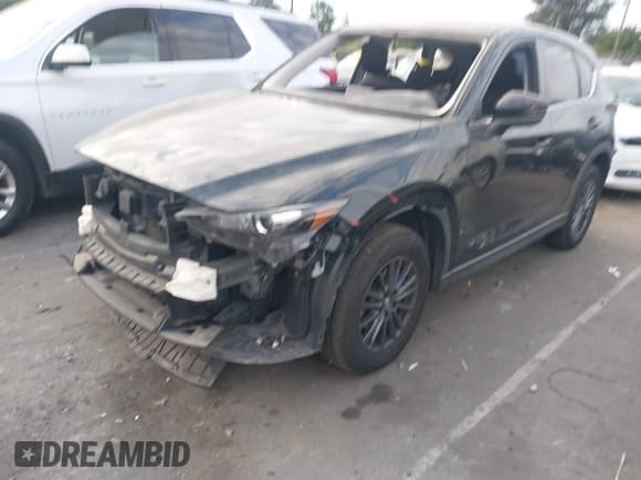 ✅ 2020 Mazda CX-5 Sport • VIN: JM3KFBBM7L0773465 • Lot: 43204122. Wystawiony na IAAI z przebiegiem 101 150 mil. Bezpłatny archiwum sprzedaży aukcyjnych z USA i szczegółowy raport historii pojazdu na DreamBid. Zdjęcie 2.