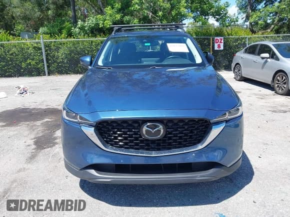 ✅ 2022 Mazda CX-5 S Carbon Edition • VIN: JM3KFBCM5N0620116 • Lot: 43033082. Listed on IAAI with 48,059 mi. Free auction sales archive from the USA and detailed vehicle history report at DreamBid. Image 12.