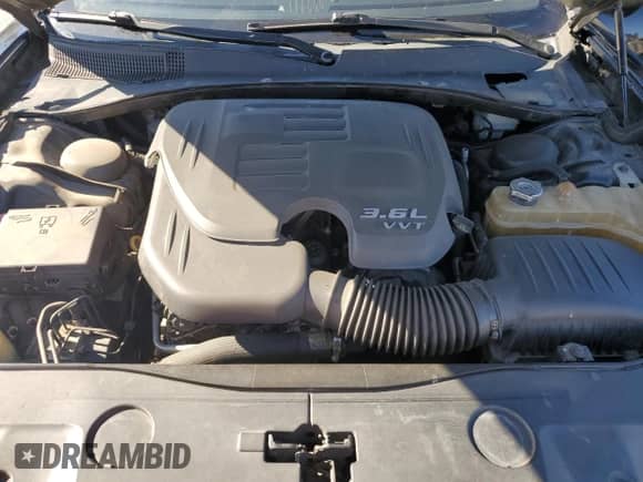 2013 Dodge Charger SXT z VIN 2C3CDXHG5DH537495, wystawiony jako Copart lot #89931325 z przebiegiem 144 857 mil mil oraz Szkoda całkowita • Salvage title. Historia ofert i sprzedaży dostępna na DreamBid. Obrazek 11.