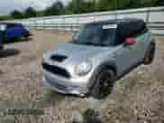 2009 MINI Hardtop S с VIN WMWMF73549TW81448, выставлен на аукционе Copart как лот 82073805 с пробегом 145 694 миль миль и Списание • Salvage title. История ставок и продаж доступна на DreamBid. Изображение 13.