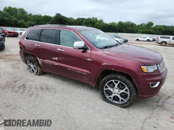 ✅ 2019 Jeep Grand Cherokee Overland • VIN: 1C4RJFCG5KC646121 • Lot: 61562885. Listed on Copart with 220,988 mi. Free auction sales archive from the USA and detailed vehicle history report at DreamBid. Image 4.