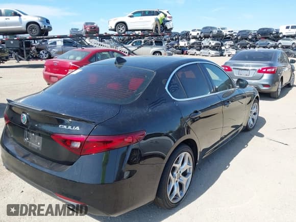 ✅ 2021 Alfa Romeo Giulia Ti Sport • VIN: ZARFAMBN2M7649941 • Lot: 41912686. Listed on IAAI with 77,626 mi. Free auction sales archive from the USA and detailed vehicle history report at DreamBid. Image 4.