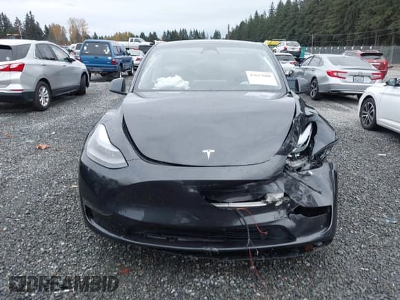 ✅ 2025 Tesla Model Y Long Range • VIN: 7SAYGDED5SF258801 • Лот: 43623000. Опубликован ранее на IAAI с пробегом 7 124 миль. Бесплатный доступ к архиву аукционных продаж из США и подробный отчёт об истории автомобиля на DreamBid. Изображение 13.