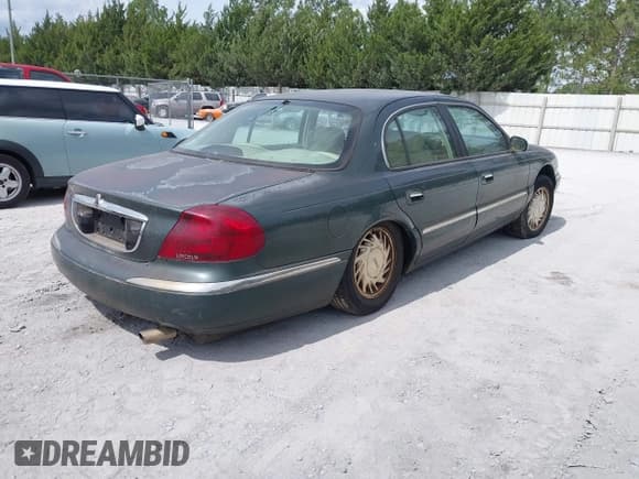 ✅ 1998 Lincoln Continental • VIN: 1LNFM97V6WY671313 • Lot: 42304977. Wystawiony na IAAI z przebiegiem 204 876 mil. Bezpłatny archiwum sprzedaży aukcyjnych z USA i szczegółowy raport historii pojazdu na DreamBid. Zdjęcie 4.