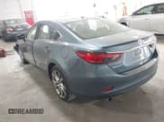 ✅ 2014 Mazda 6 i Grand Touring • VIN: JM1GJ1W67E1159404 • Lot: 42702402. Listed on IAAI with 107,039 mi. Free auction sales archive from the USA and detailed vehicle history report at DreamBid. Image 3.