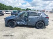 ✅ 2023 Mazda CX-5 S Carbon Edition • VIN: JM3KFBCM3P0262534 • Лот: 42740448. Опубликован ранее на IAAI с пробегом 10 257 миль. Бесплатный доступ к архиву аукционных продаж из США и подробный отчёт об истории автомобиля на DreamBid. Изображение 15.