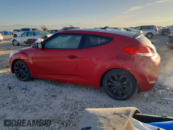 2012 Hyundai Veloster w/Red Int z VIN KMHTC6AD5CU067498, wystawiony jako Copart lot #90810075 z przebiegiem 132 773 mil mil oraz Czysty tytuł • Clean title. Historia ofert i sprzedaży dostępna na DreamBid. Obrazek 2.