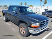 ✅ 2002 Dodge Dakota SLT • VIN: 1B7HG48N82S634864 • Lot: 41839572. Wystawiony na IAAI z przebiegiem 138 557 mil. Bezpłatny archiwum sprzedaży aukcyjnych z USA i szczegółowy raport historii pojazdu na DreamBid. Zdjęcie 1.