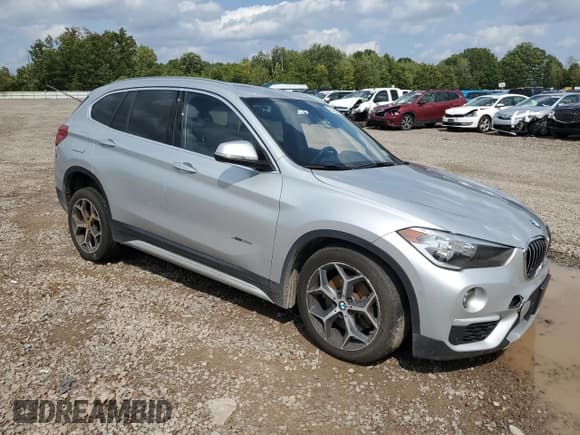 ✅ 2018 BMW X1 xDrive28i • VIN: WBXHT3C39J5K22125 • Lot: 70426845. Listed on Copart with 107,913 mi. Free auction sales archive from the USA and detailed vehicle history report at DreamBid. Image 4.