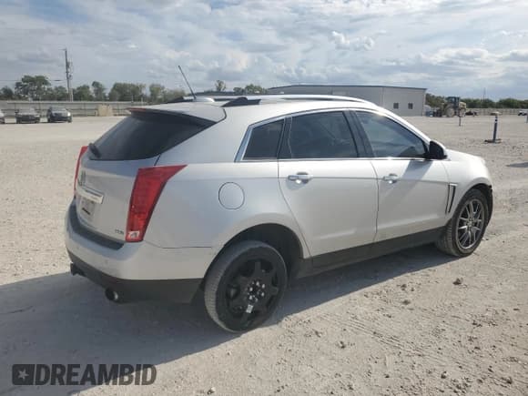 ✅ 2015 Cadillac SRX Luxury Collection • VIN: 3GYFNBE35FS573076 • Lot: 90132695. Wystawiony na Copart z przebiegiem 135 368 mil. Bezpłatny archiwum sprzedaży aukcyjnych z USA i szczegółowy raport historii pojazdu na DreamBid. Zdjęcie 3.