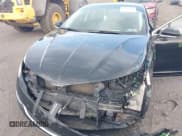 ✅ 2016 Lincoln MKZ • VIN: 3LN6L2J93GR607607 • Lot: 42810370. Listed on IAAI with 131,030 mi. Free auction sales archive from the USA and detailed vehicle history report at DreamBid. Image 6.