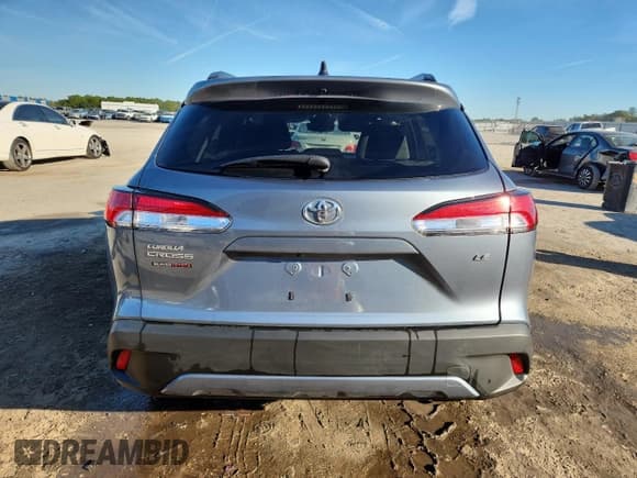 ✅ 2025 Toyota Corolla Cross LE • VIN: 7MUCAAAG6SV118989 • Лот: 89824055. Опубликован ранее на Copart с пробегом 23 011 миль. Бесплатный доступ к архиву аукционных продаж из США и подробный отчёт об истории автомобиля на DreamBid. Изображение 6.