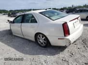 ✅ 2007 Cadillac STS • VIN: 1G6DW677570130889 • Lot: 58073275. Listed on Copart with 124,168 mi. Free auction sales archive from the USA and detailed vehicle history report at DreamBid. Image 2.