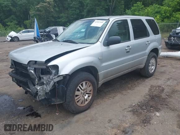 2005 Mercury Mariner Luxury с VIN 4M2YU56155DJ18530, выставлен на аукционе IAAI как лот 42307355 с пробегом 74 905 миль миль и . История ставок и продаж доступна на DreamBid. Изображение 2.