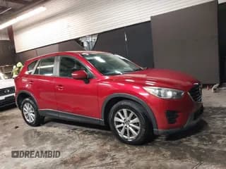 ✅ 2016 Mazda CX-5 Sport • VIN: JM3KE2BY4G0781924 • Lot: 43797401. Listed on IAAI with 78,674 mi. Free auction sales archive from the USA and detailed vehicle history report at DreamBid. Image 1.