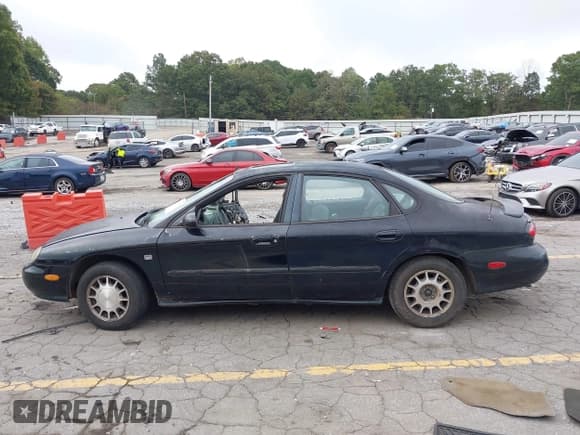 ✅ 1998 Ford Taurus SE Comfort • VIN: 1FAFP53S0WG125666 • Lot: 43381901. Wystawiony na IAAI z przebiegiem 196 646 mil. Bezpłatny archiwum sprzedaży aukcyjnych z USA i szczegółowy raport historii pojazdu na DreamBid. Zdjęcie 15.