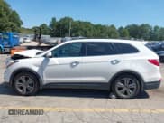 ✅ 2014 Hyundai Santa Fe GLS • VIN: KM8SN4HF5EU072835 • Лот: 43180919. Опубликован ранее на IAAI с пробегом 193 438 миль. Бесплатный доступ к архиву аукционных продаж из США и подробный отчёт об истории автомобиля на DreamBid. Изображение 14.