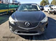 ✅ 2016 Mazda CX-5 Sport • VIN: JM3KE4BY8G0754723 • Lot: 90022705. Wystawiony na Copart z przebiegiem 102 496 mil. Bezpłatny archiwum sprzedaży aukcyjnych z USA i szczegółowy raport historii pojazdu na DreamBid. Zdjęcie 5.