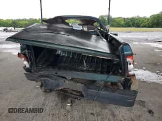 1995 Dodge Dakota z VIN 1B7FL26X4SW940741, wystawiony jako Copart lot #58391525 z przebiegiem 101 431 mil mil oraz Szkoda całkowita • Salvage title. Historia ofert i sprzedaży dostępna na DreamBid. Obrazek 6.