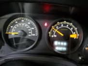 ✅ 2015 Jeep Patriot Latitude • VIN: 1C4NJRFBXFD382684 • Lot: 92694265. Listed on Copart with 103,277 mi. Free auction sales archive from the USA and detailed vehicle history report at DreamBid. Image 9.