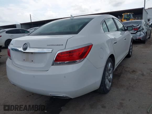 ✅ 2013 Buick LaCrosse Leather • VIN: 1G4GC5E3XDF123759 • Lot: 42130959. Listed on IAAI with 194,185 mi. Free auction sales archive from the USA and detailed vehicle history report at DreamBid. Image 4.