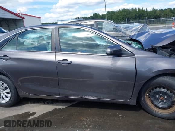 2015 Toyota Camry LE with VIN 4T4BF1FK4FR446399, listed as a IAAI auction lot 43128423 with 82,545 mi miles and . Bid and sale history available at DreamBid. Image 14.