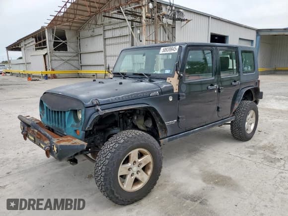 ✅ 2008 Jeep Wrangler Unlimited Rubicon • VIN: 1J4GA69128L529271 • Lot: 58939945. Listed on Copart with 94,503 mi. Free auction sales archive from the USA and detailed vehicle history report at DreamBid. Image 1.