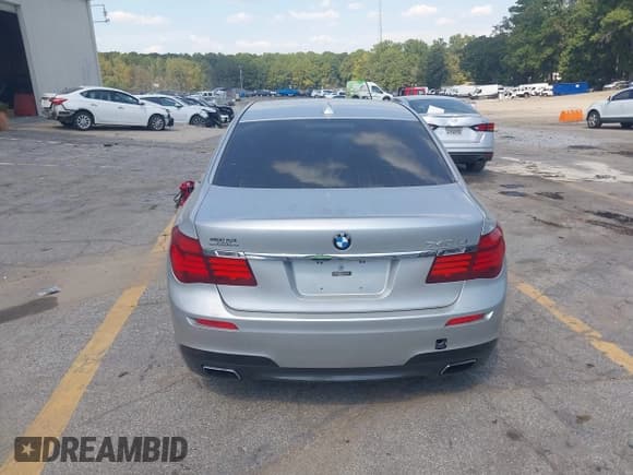 ✅ 2014 BMW 7 Series 740Li • VIN: WBAYE4C58ED138126 • Lot: 43217619. Listed on IAAI with 150,241 mi. Free auction sales archive from the USA and detailed vehicle history report at DreamBid. Image 17.