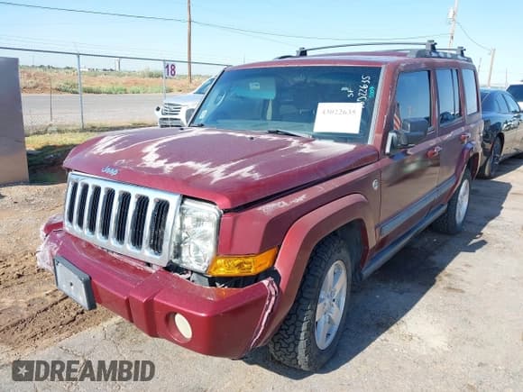 ✅ 2007 Jeep Commander Sport • VIN: 1J8HG48P37C695017 • Lot: 43022635. Listed on IAAI with 181,902 mi. Free auction sales archive from the USA and detailed vehicle history report at DreamBid. Image 2.