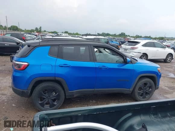 2021 Jeep Compass Latitude with VIN 3C4NJDBB2MT595256, listed as a IAAI auction lot 43058271 with 102,541 mi miles and . Bid and sale history available at DreamBid. Image 13.