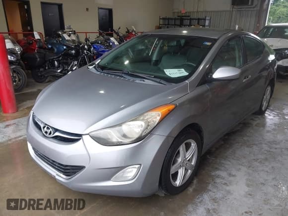 ✅ 2013 Hyundai Elantra GLS • VIN: KMHDH4AE1DU760590 • Lot: 43317897. Listed on IAAI with 255,497 mi. Free auction sales archive from the USA and detailed vehicle history report at DreamBid. Image 2.