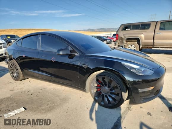 ✅ 2022 Tesla Model 3 Performance • VIN: 5YJ3E1ECXNF260275 • Лот: 71271615. Опубликован ранее на Copart с пробегом 56 766 миль. Бесплатный доступ к архиву аукционных продаж из США и подробный отчёт об истории автомобиля на DreamBid. Изображение 4.