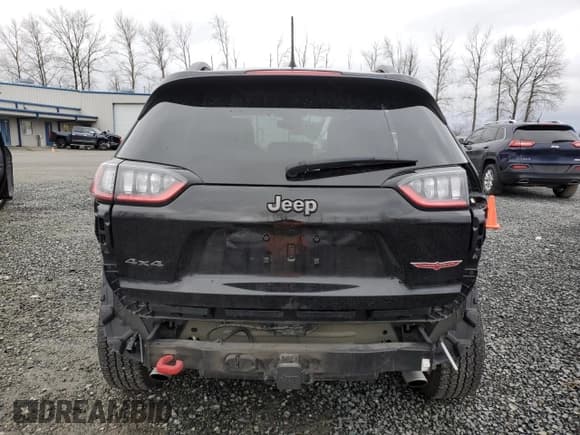 ✅ 2020 Jeep Cherokee Trailhawk Elite • VIN: 1C4PJMBX9LD597319 • Lot: 86362504. Listed on Copart with 21,050 mi. Free auction sales archive from the USA and detailed vehicle history report at DreamBid. Image 6.