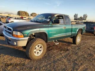 ✅ 1997 Dodge Dakota • VIN: 1B7GG23Y0VS164884 • Lot: 84769044. Wystawiony na Copart z przebiegiem 130 881 mil. Bezpłatny archiwum sprzedaży aukcyjnych z USA i szczegółowy raport historii pojazdu na DreamBid. Zdjęcie 1.