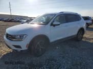 ✅ 2018 Volkswagen Tiguan SEL • VIN: 3VV3B7AX3JM047891 • Лот: 41615545. Опубликован ранее на Copart с пробегом 63 995 миль. Бесплатный доступ к архиву аукционных продаж из США и подробный отчёт об истории автомобиля на DreamBid. Изображение 1.