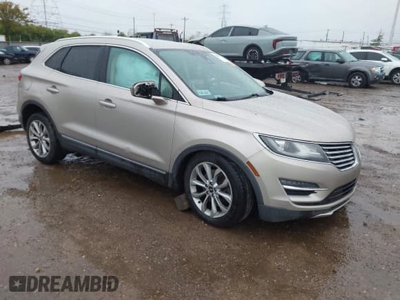 ✅ 2015 Lincoln MKC • VIN: 5LMCJ1A90FUJ07217 • Lot: 43564711. Wystawiony na IAAI z przebiegiem 169 547 mil. Bezpłatny archiwum sprzedaży aukcyjnych z USA i szczegółowy raport historii pojazdu na DreamBid. Zdjęcie 1.