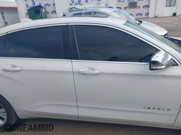 ✅ 2015 Chevrolet Impala LT • VIN: 2G1115SL5F9146987 • Lot: 40266576. Listed on IAAI with 141,786 mi. Free auction sales archive from the USA and detailed vehicle history report at DreamBid. Image 13.
