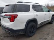 ✅ 2023 GMC Acadia AT4 • VIN: 1GKKNLLS5PZ110674 • Lot: 43701682. Listed on IAAI with 51,764 mi. Free auction sales archive from the USA and detailed vehicle history report at DreamBid. Image 4.