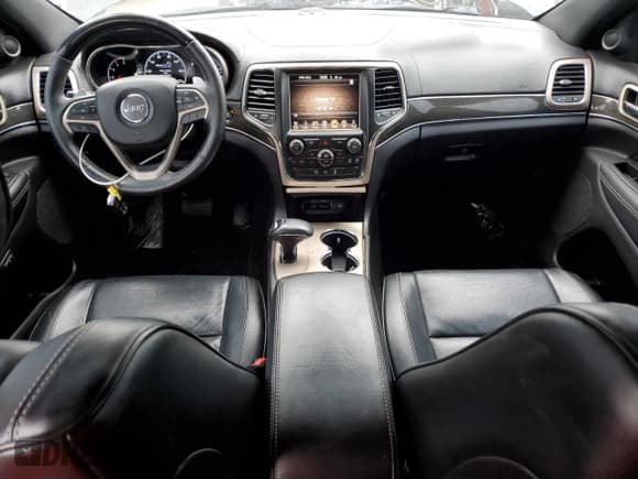 ✅ 2015 Jeep Grand Cherokee Overland • VIN: 1C4RJFCM7FC880093 • Lot: 82241784. Listed on Copart with 158,346 mi. Free auction sales archive from the USA and detailed vehicle history report at DreamBid. Image 8.