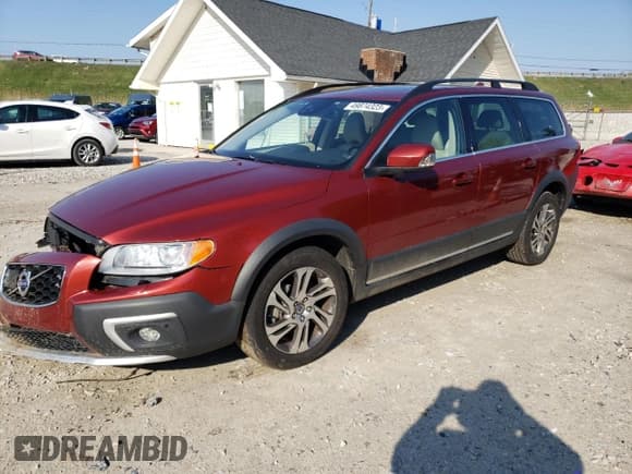 ✅ 2015 Volvo XC70 • VIN: YV440MBM9F1223260 • Lot: 49874323. Listed on Copart with 119,474 mi. Free auction sales archive from the USA and detailed vehicle history report at DreamBid. Image 1.