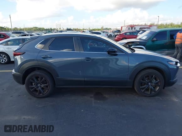✅ 2023 Mazda CX-30 S Carbon Edition • VIN: 3MVDMBCM6PM541737 • Lot: 42524854. Listed on IAAI with 55,093 mi. Free auction sales archive from the USA and detailed vehicle history report at DreamBid. Image 13.