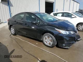 ✅ 2018 Chevrolet Cruze LS • VIN: 1G1BC5SMXJ7213696 • Lot: 47322473. Listed on Copart with 87,917 mi. Free auction sales archive from the USA and detailed vehicle history report at DreamBid. Image 4.