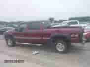 2002 Chevrolet Silverado 1500HD LT z VIN 1GCGK13U62F205030, wystawiony jako IAAI lot #42913610 z przebiegiem 263 908 mil mil oraz . Historia ofert i sprzedaży dostępna na DreamBid. Obrazek 14.